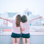 two women on balcony